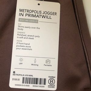 Size 8 new w/tag on, drawstring 2 pockets.